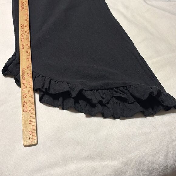 Black Ruffle Hem Wide-Leg Gaucho Pants. Elastic waist and ruffle hemline - Picture 9 of 11